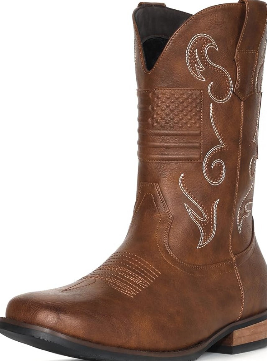 Tan brown cowboy boot with embossed American flag detail and white scrollwork stitching on shaft, square toe